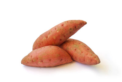 Close-up of bread on white background