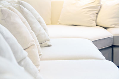 Close-up of cushions on sofa at home