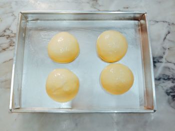 High angle view of eggs in container on table