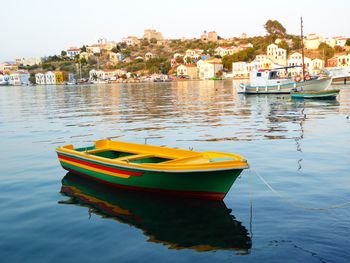 Boats moored in sea