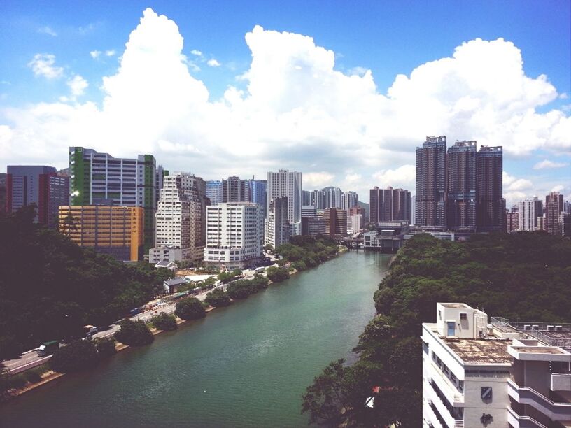 building exterior, architecture, built structure, sky, water, city, cloud - sky, cloud, river, cityscape, residential building, residential structure, tree, residential district, waterfront, day, cloudy, building, skyscraper, blue