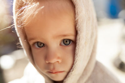 Portrait of cute girl with grey eyes