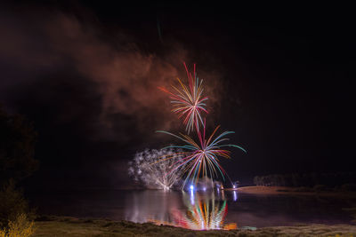 Firework display at night