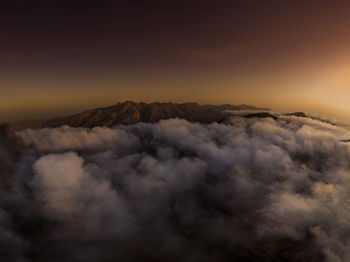 Scenic view of mountains against sky during sunset