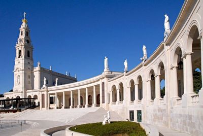 View of historic building against clear blue sky