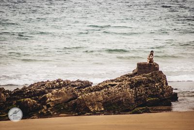 Scenic view of rocks on beach