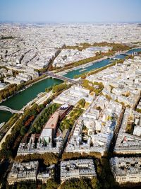 High angle view of river amidst buildings in city