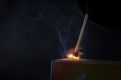 Close-up of illuminated candle