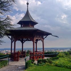 Gazebo against cloudy sky