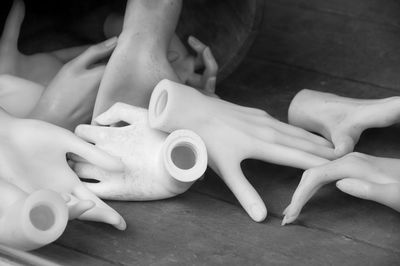 High angle view of artificial hands on table