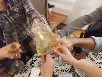 Close-up of people drinking glass