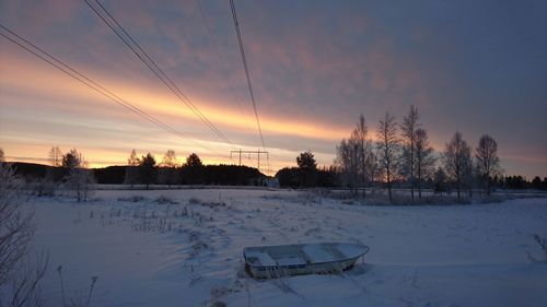 Scenic view of landscape against sky during winter