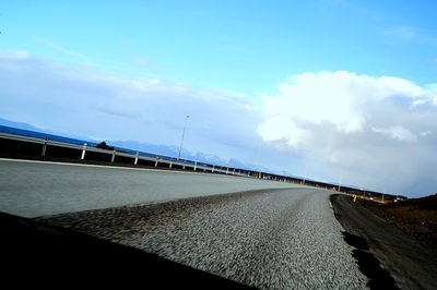 View of bridge over calm sea