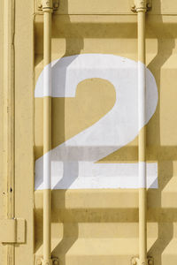 Close-up of number on wall