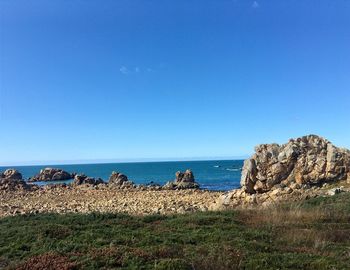 Scenic view of rocks on beach 