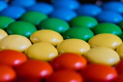 Full frame shot of multi colored candies. rainbow of multicolored sweet dragees 