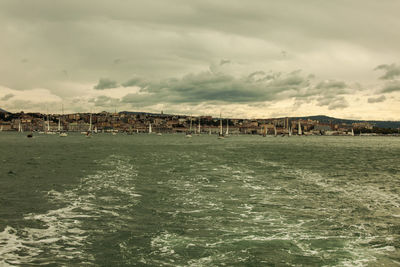 Scenic view of sea against cloudy sky