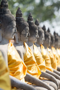 Buddha statues in row at wat yai chai mongkhon