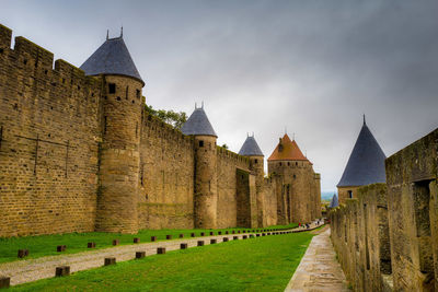 Historic building against sky carcassone castle