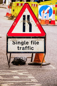 Information sign on road in city