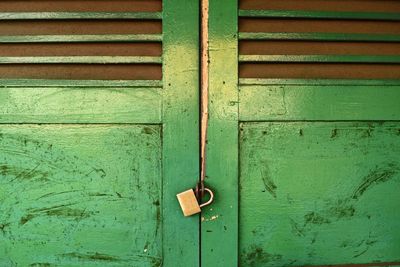 Close-up of closed green door