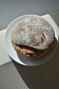 High angle view of bread served on table