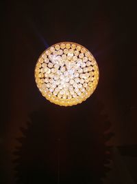 Low angle view of illuminated chandelier