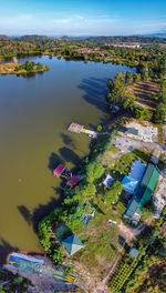 High angle view of trees and buildings against sky