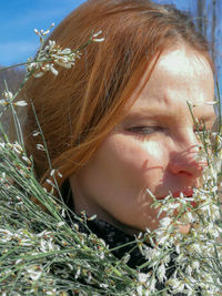 Close-up portrait of young woman