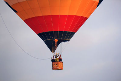 Low angle view of hot air balloon flying in sky