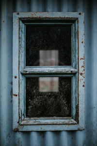 Close-up of rusty window