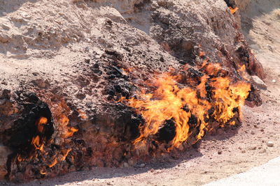 View of fire on rock