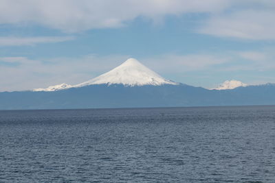 Scenic view of volcanic mountain against sky