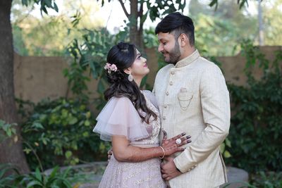 Young couple standing outdoors