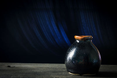 Close-up of jar on table