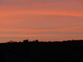 Scenic view of orange sky