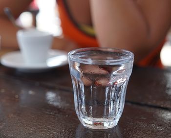 Close-up of drinking glass on table