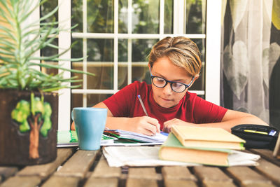 Boy studying at home