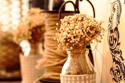 Close-up of flower vase on table