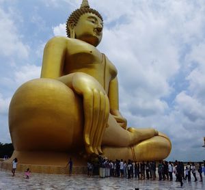 Low angle view of statue against sky