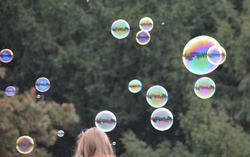 Close-up of bubbles against blurred background