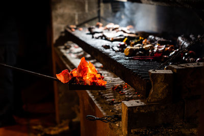 Close-up of meat on barbecue grill