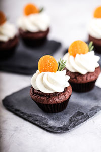 Close-up of cup cakes on table