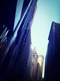 Low angle view of buildings against clear sky