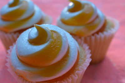 Close-up of mango cupcakes on table