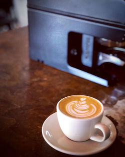 Coffee cup on table