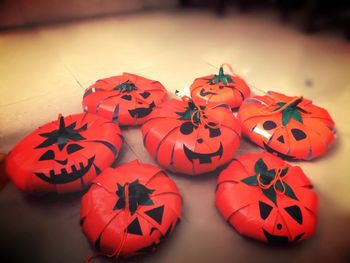 Artificial halloween pumpkins on flooring at home