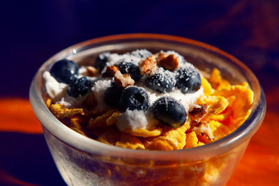 Breakfast with blueberry . berries with corn flakes