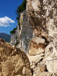 Low angle view of rocks against sky