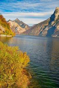 Scenic view of lake against sky during autumn